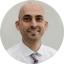The headshot portrait of smiling Henri Yassa, Internet Director in Riverside Metro Group